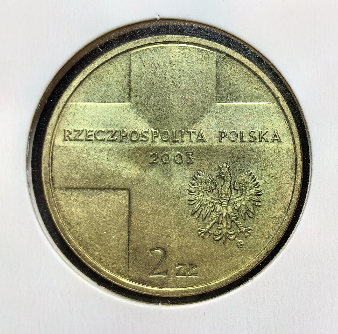 外国优质老铜币银币苏联纪念章，每周六晚九点倒数截拍，满百包邮可寄存，持续收拍 波兰2003年2兹罗提纪念币，为纪念若望・保禄二世任教宗 25 周年发行。正面为波兰国徽与十字，背面是教皇肖像与权杖，见证波兰对这位本土教宗的崇敬与宗教文化传承。