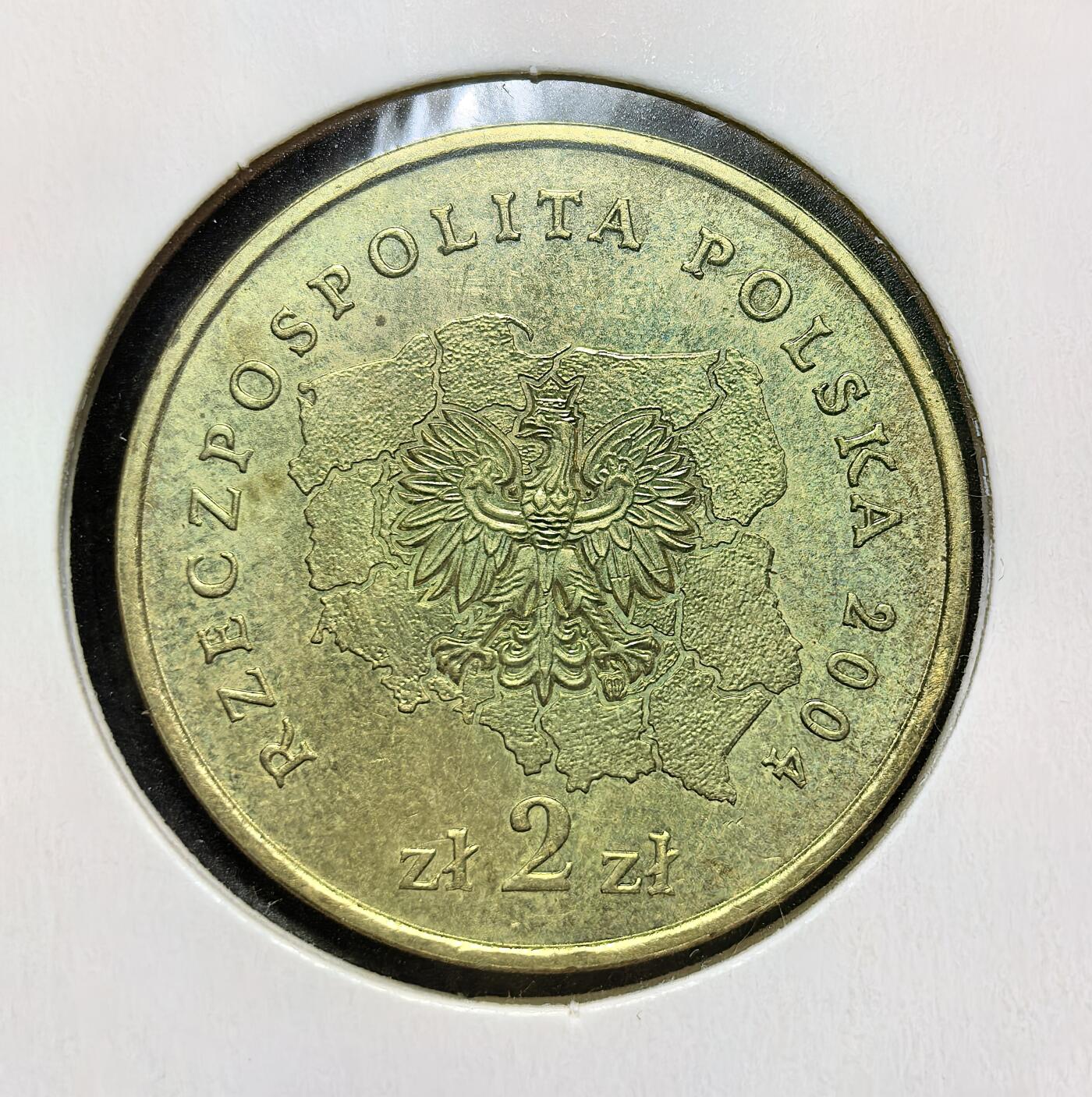 外国优质老铜币银币苏联纪念章，每周六晚九点倒数截拍，满百包邮可寄存，持续收拍 波兰2004年2兹罗提纪念币，正面为波兰国徽白鹰与地图轮廓，背面为波德拉谢省省徽（白鹰与骑士），纪念该地区历史文化与国家认同，是波兰行政区划系列的重要藏品。