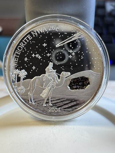 第193期拍卖 -  利比里亚2004年镶嵌撒哈拉NWA267陨石纪念银币，999银，2盎司，发行999枚