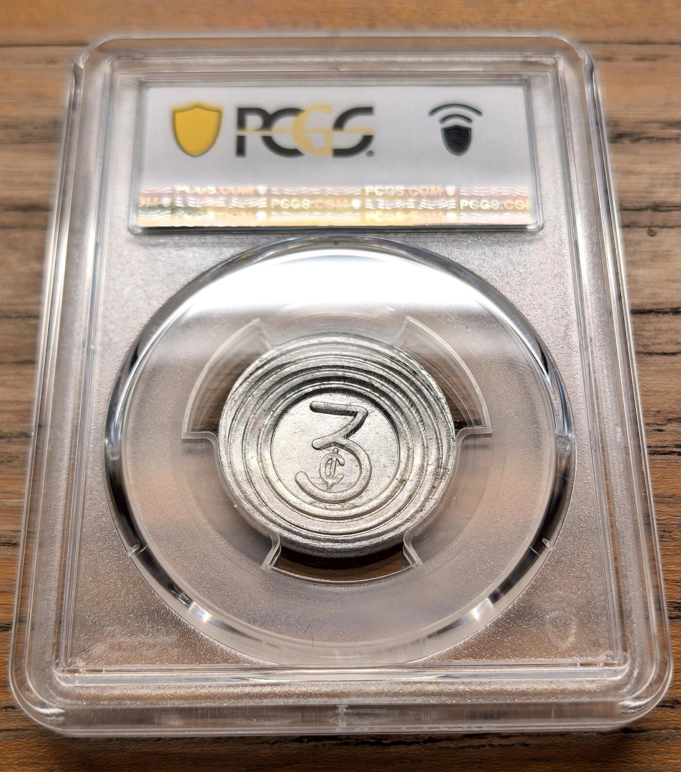 凡希社世界钱币微拍第三百二十一期 1939上海法租界巴士3分代用币PCGS-AU58，巴士左向稀缺版别，上海法租界巴士代用币分“Left（左向）”和“Right（右向）”版，Left版存世量远少于Right版，多为试铸或早期发行，目录编号Lec-1，实物原光充沛，略有弱打。