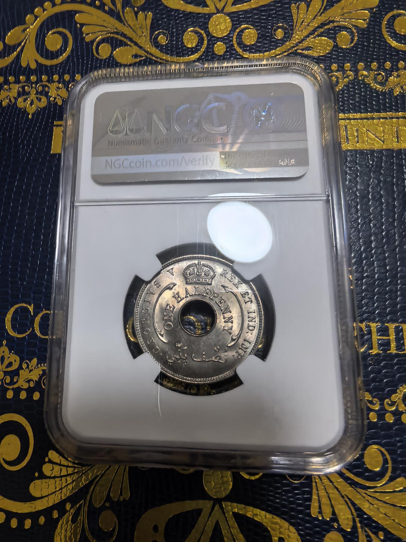 长老汇马年精选第九场拍卖 1935 英属西非乔治五世1/2便士中孔铜镍币，NGC MS63，更高5枚