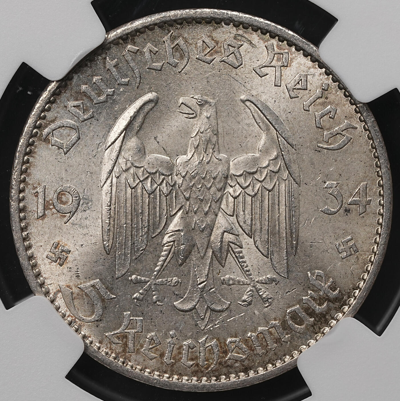 修遠堂世界钱币第107期 NGC MS63 1934年德国教堂5马克银币，少见加字版，A厂铭