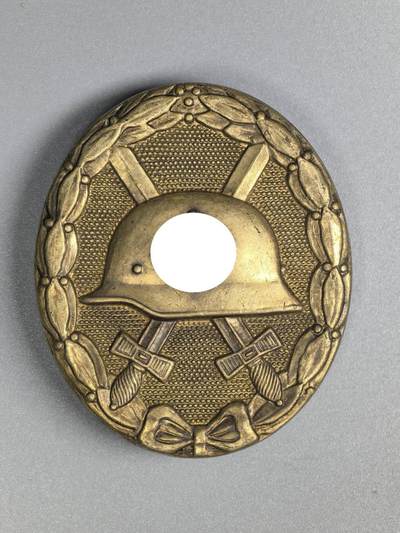 小驴勋章奖章收藏3月14日周六晚六点拍卖（珍爱和平，收藏战争，铭记历史，勿忘国耻，忠党爱国。有偿代拍，送拍规则在简介最后，参拍须阅读规则后再参拍，关系到运费包装发货时效真假辨别等关键信息，拍卖时不再发原图，看大图店主微信码在拍卖店铺介绍里） - 金级战伤奖章，铜合金