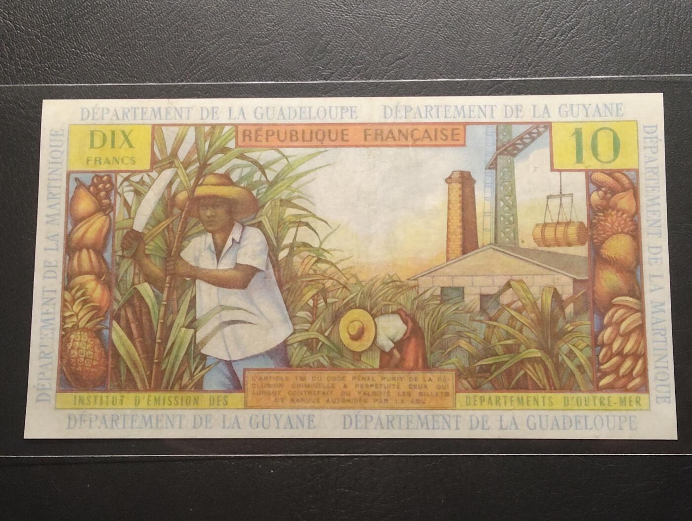 2026三月第二期，总219期 法属安的列斯1963版10法郎流通好品XF 民族服饰女孩和甘蔗收获