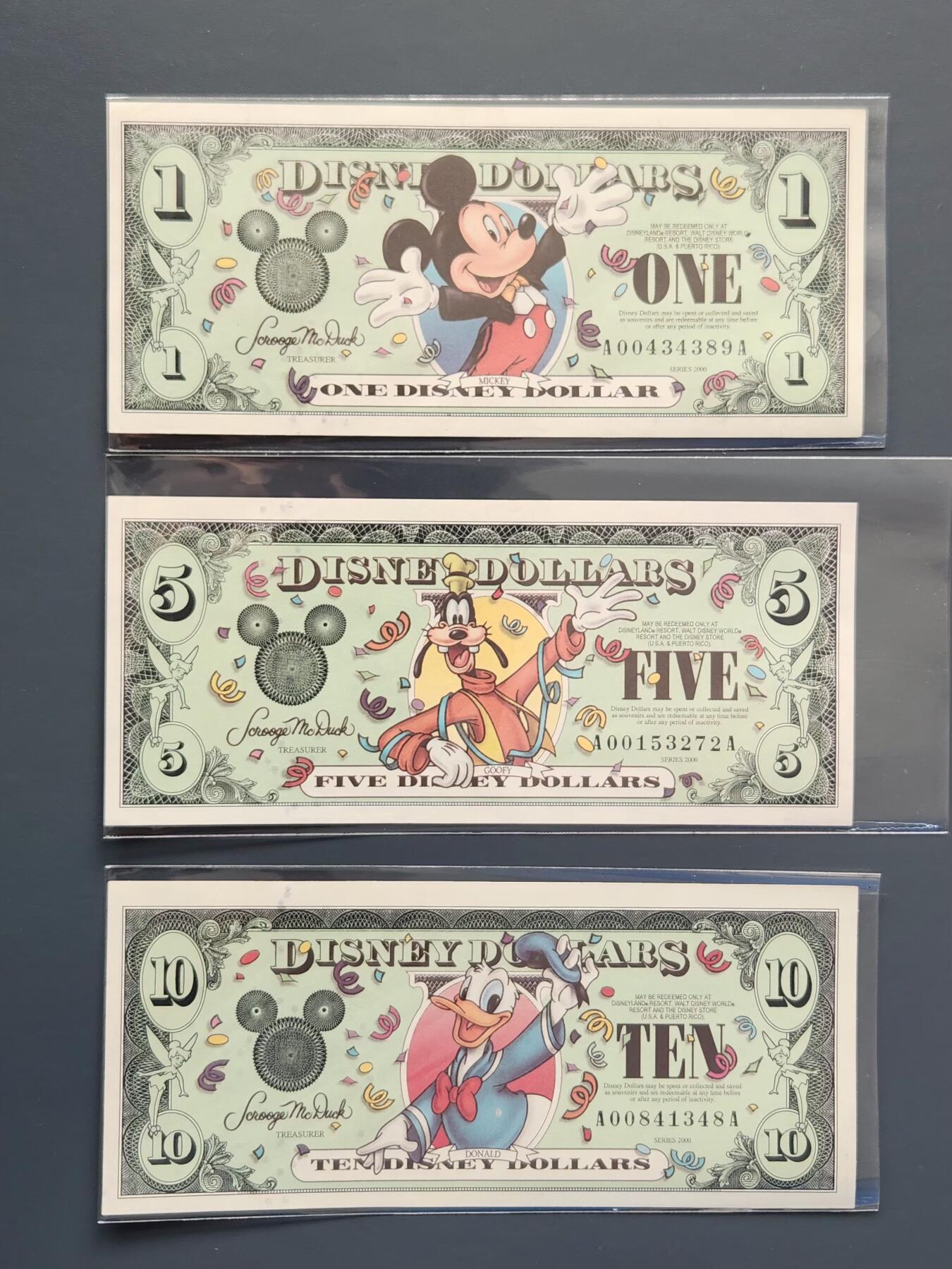 3月14号晚上8点 外国纸币自动截拍第38场 迪士尼2000年1-5-10元 新品一套