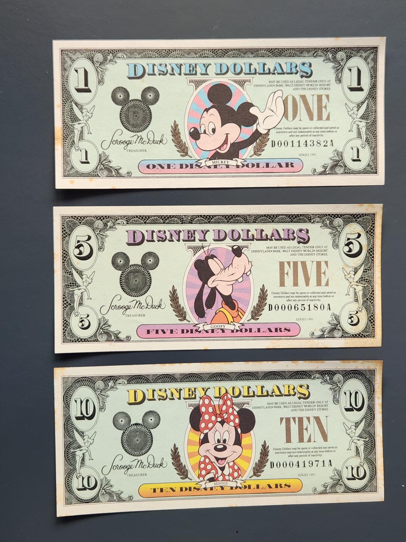 3月14号晚上8点 外国纸币自动截拍第38场 迪士尼1991年1-5-10元 原票一套