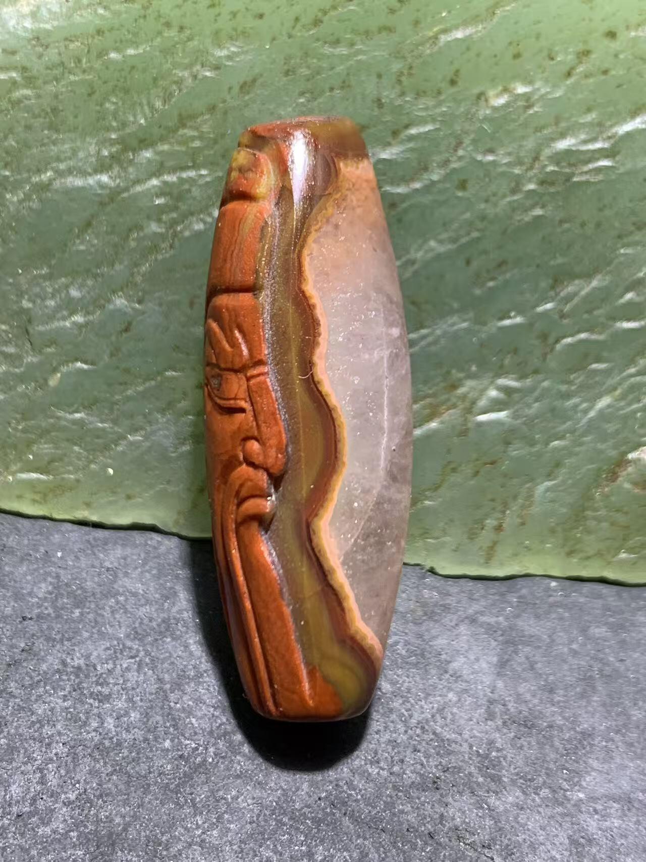 精美冰飘亚光战国红玛瑙手工俏色巧雕武财神忠义关二爷随形桶珠一颗