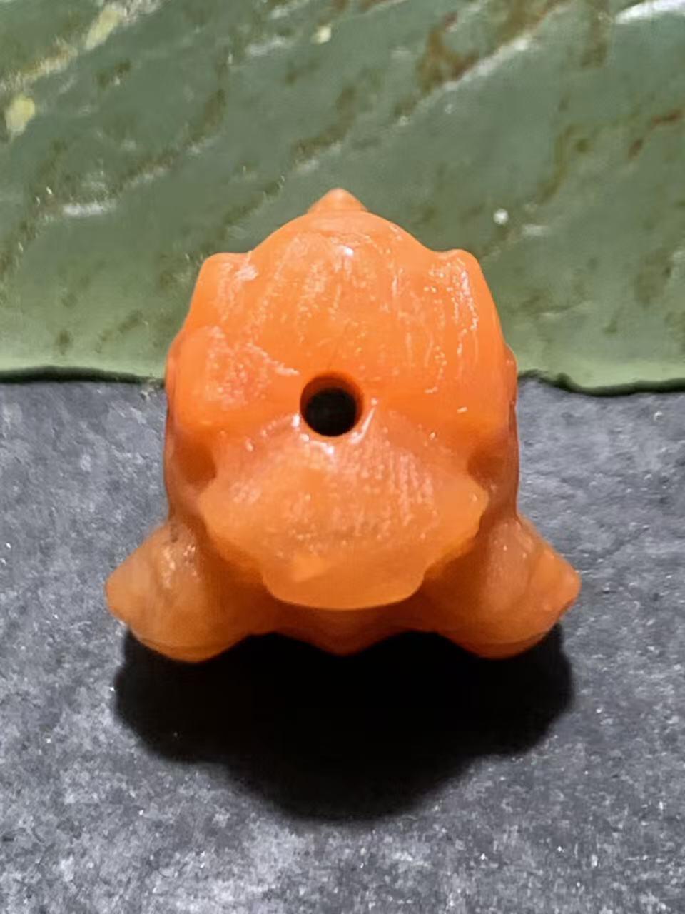 精美川料柿子红南红玛瑙雕刻骷髅珠一个，