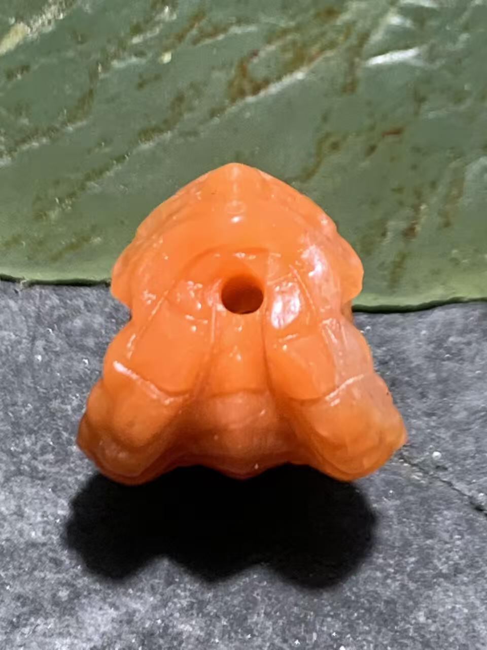 精美川料柿子红南红玛瑙雕刻骷髅珠一个，