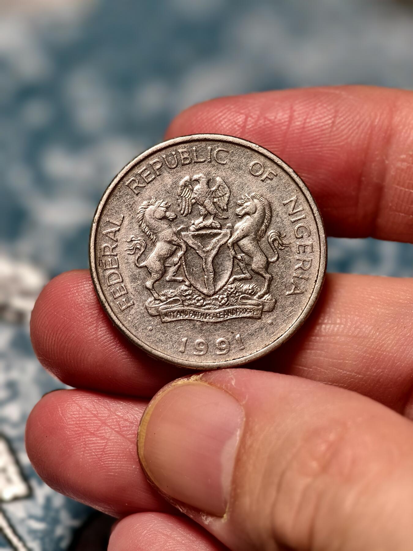 抚柳草堂-第十六期章牌钱币  奖章勋章限时免佣 满百包邮 放漏专场 尼日利亚1991年1奈拉硬币  比一般的硬币要厚很多 有意思的品种