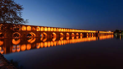 【Blue Auction】✨世界纸币精拍800期盛典——白金之夜🔥🔥🔥 I-【莫塔扎维博士旧藏 唯一冠军分罕见 未发行最高值 大珍】伊朗 1938年10000里亚尔 PMG67EPQ 超级大票幅 正面礼萨-汗国王 两侧为阿里卡普王宫和波斯波利斯遗址 背面为伊斯法罕著名的十三孔桥 伊斯兰纹饰点缀非常漂亮 该张纸币系礼萨-汗为推动伊朗20世纪现代化努力和国家金融改革形成的产物 但最终未发行 仅有样钞存世 无可挑剔的品相难以超越