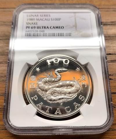 凡希社世界钱币微拍第三百二十一期 - 1989中国澳门生肖蛇年100元大银精铸NGC-PF69UC