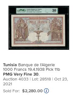 【Blue Auction】✨世界纸币精拍800期盛典——白金之夜🔥🔥🔥 T-【唯一冠军分 无背标 法属大珍 正面右侧加盖，错标，远比普通阿尔及利亚P83a版稀有】突尼斯1939年1000法郎  P-11b 正面、背面及水印人物皆以法兰西和阿拉伯妇孺对称式布局 表现殖民帝国不偏不倚的态度 设计精美繁复华丽 超大票幅 PMG50（换壳后亚军分只有30，本张断层式领先）（外拍出现过的最佳品相30分有背标已拍出2280美金，本张必将引来激烈竞价）