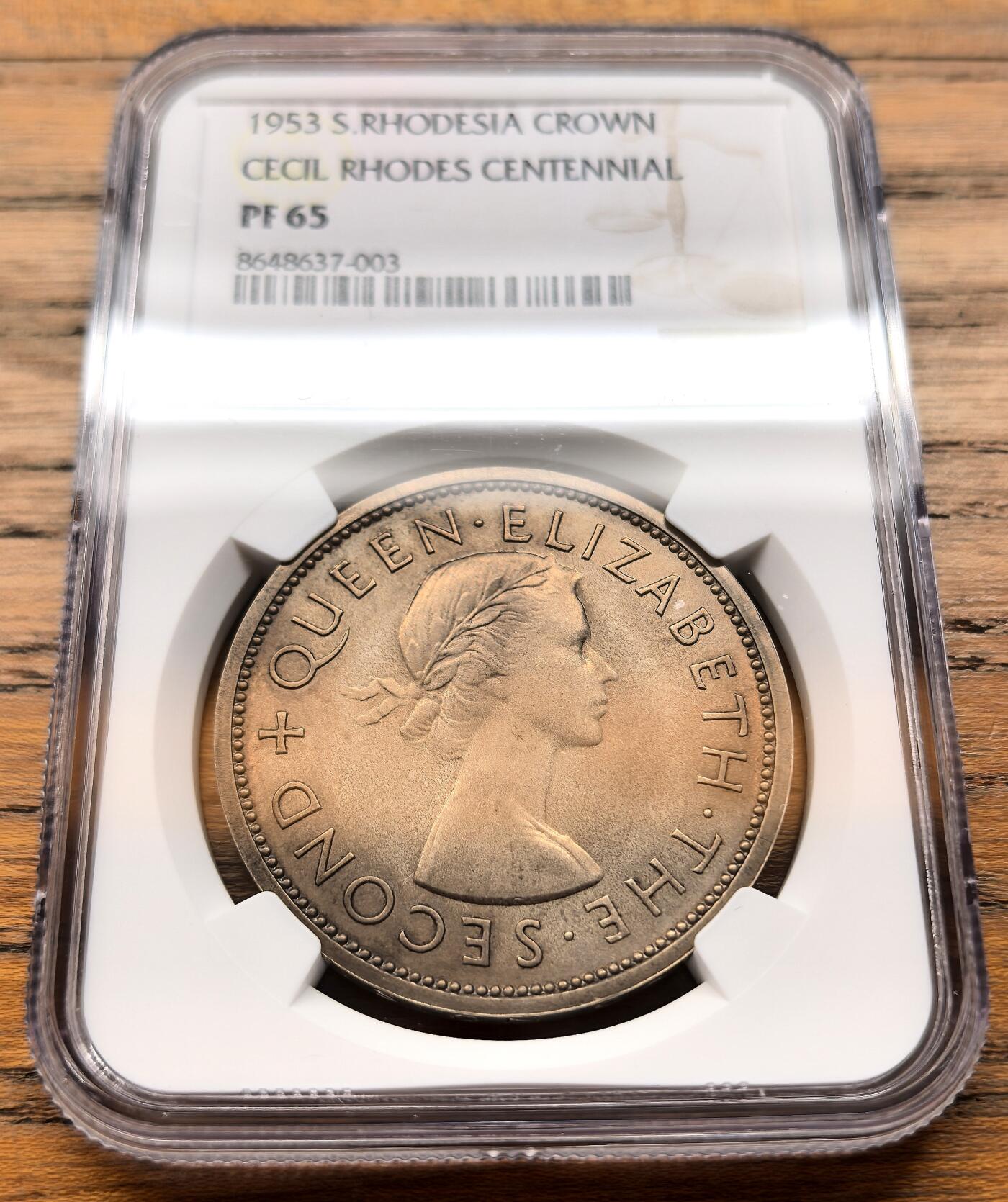 凡希社世界钱币微拍第三百二十一期 1953南罗德西亚克朗大银精铸NGC-PF65，附原盒。