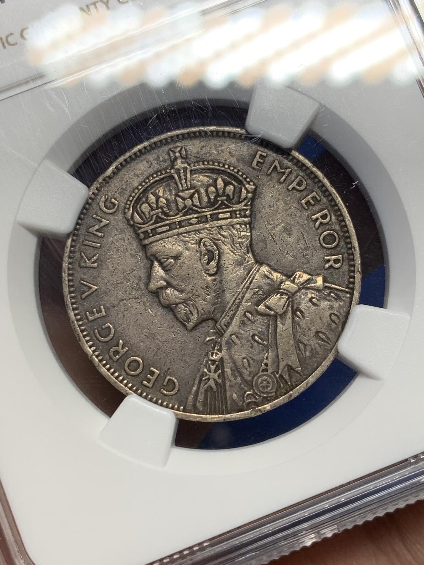 《竞宝斋》第470场 周日，周一，周二 3场连拍 （全场包邮）欢迎送拍 NGC XF45 印度洋岛国毛里求斯1934年1卢比银币，主币，乔治五世像，经典老版，发行量稀少，收藏价值高。币面细节清晰，包浆自然，品相不错。