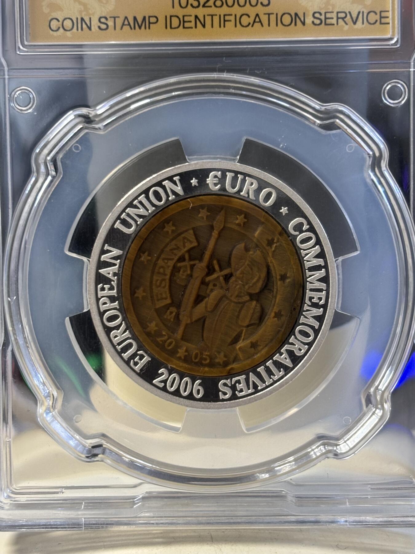 第194期拍卖 朝鲜2006年西班牙镶嵌虎眼石纪念银币信泰评级69分，999银，15.5克，发行3000枚