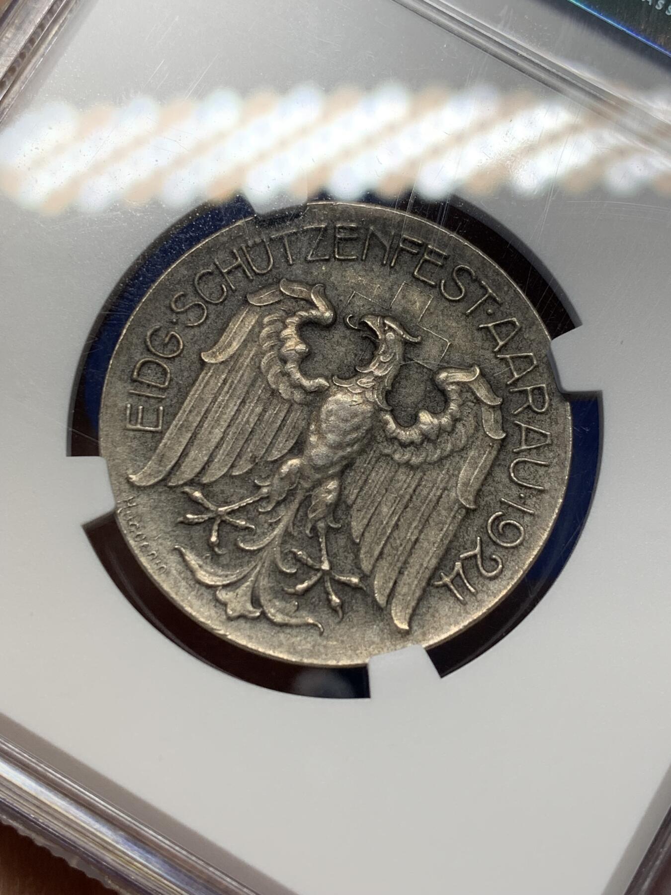 《竞宝斋》第470场 周日，周一，周二 3场连拍 （全场包邮）欢迎送拍 NGC MS64 瑞士1924年阿尔高州阿劳射击节银章 磨砂质感 鹰徽细腻 整体包浆搭配图案映衬出十足朦胧感