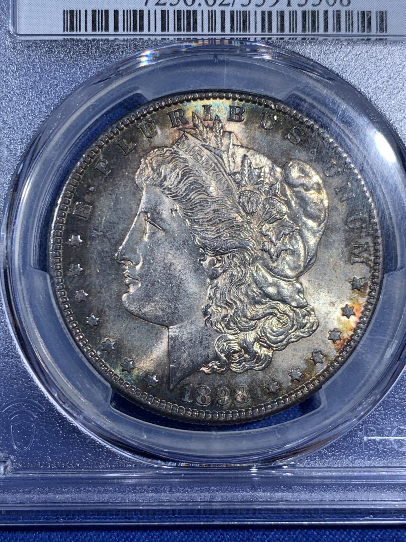 《竞宝斋》第470场 周日，周一，周二 3场连拍 （全场包邮）欢迎送拍 PCGS MS62 美国 1898 S 摩根银币 此年分钱币大多充分流通 稀有品种 双面环状五彩包浆 不可多得的藏品 PCGS指导价4511 低评