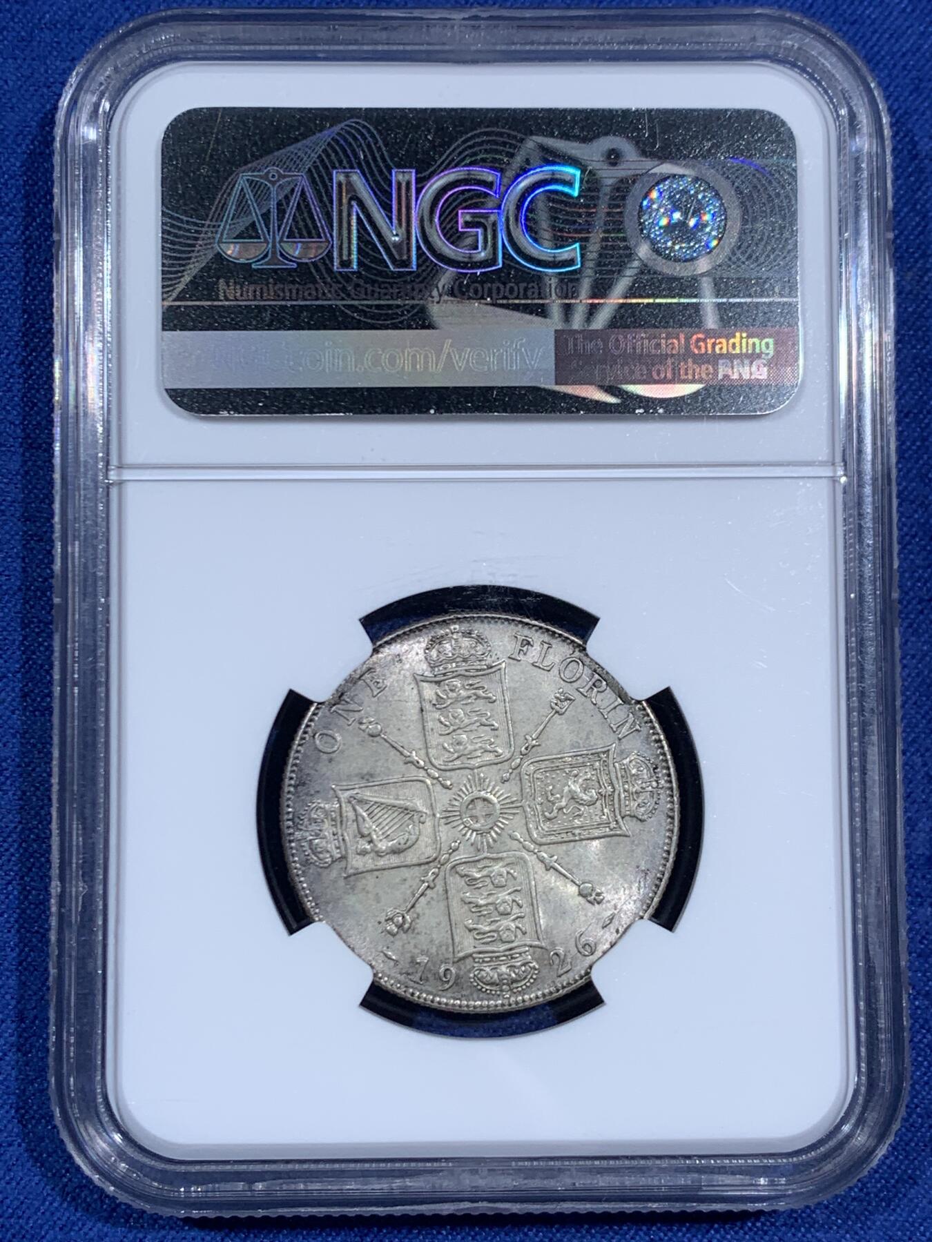 《竞宝斋》第470场 周日，周一，周二 3场连拍 （全场包邮）欢迎送拍 NGC MS64 英国1926年乔治五世流通版1福林银币，1福林=2先令。原色银光，状态舒服。流通充分的品种，高分很难得，更高仅有4枚，乔五流通凑套必备。克书价同分175美元