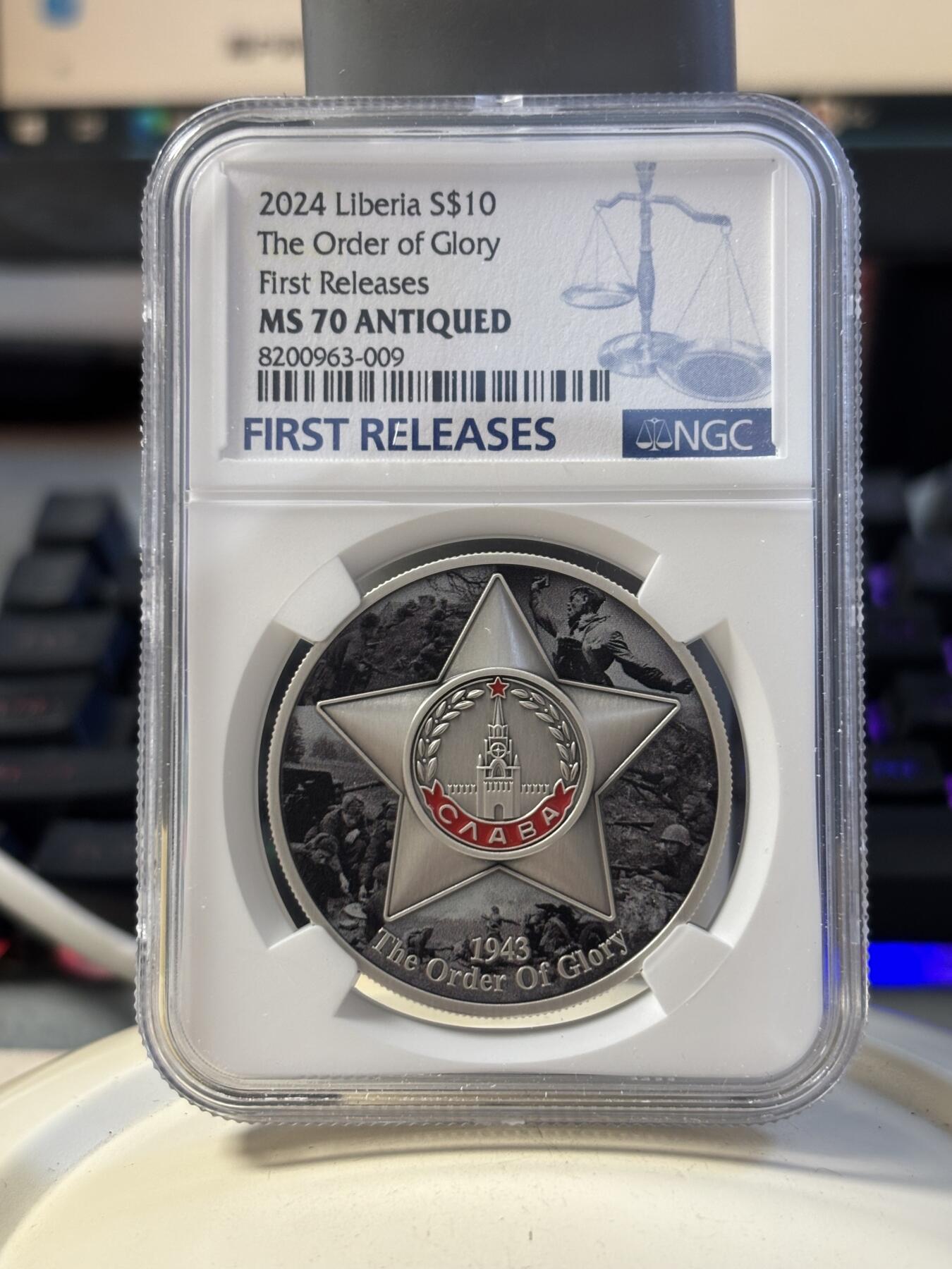 第194期拍卖 利比里亚2024年二战光荣勋章1盎司仿古彩珐琅银币NGC-MS70首，999银，发行43枚