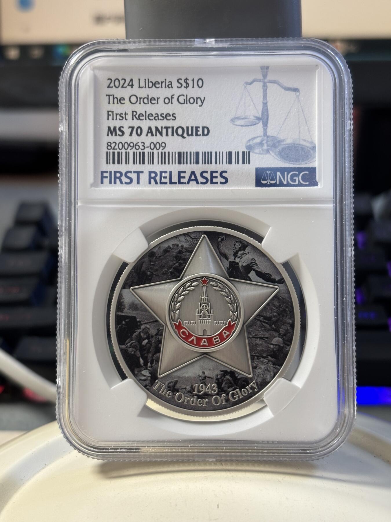第194期拍卖 利比里亚2024年二战光荣勋章1盎司仿古彩珐琅银币NGC-MS70首，999银，发行43枚