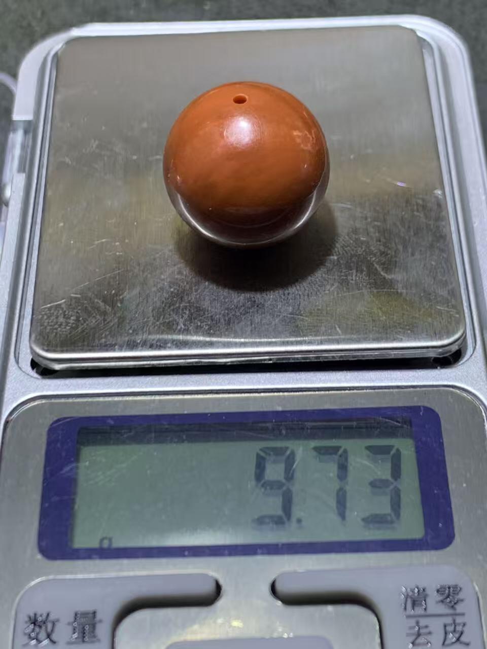 南红玛瑙柿子红圆珠一颗，