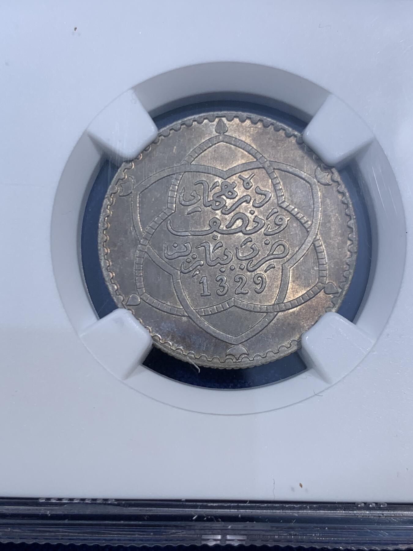 《竞宝斋》第470场 周日，周一，周二 3场连拍 （全场包邮）欢迎送拍 NGC MS62 摩洛哥 AH1329(1911) 1/4里亚尔银币 MS少见