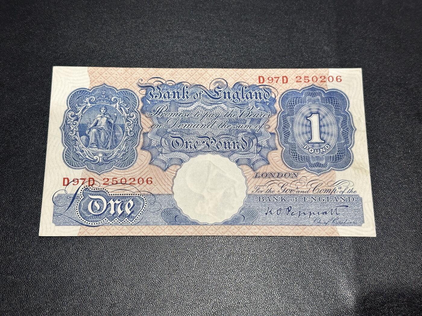 《外钞收藏家》第六百一十八期（精品场）（长期征集拍品、欢迎藏友们联系合作） 英国A序列1镑 非全新 品相如图