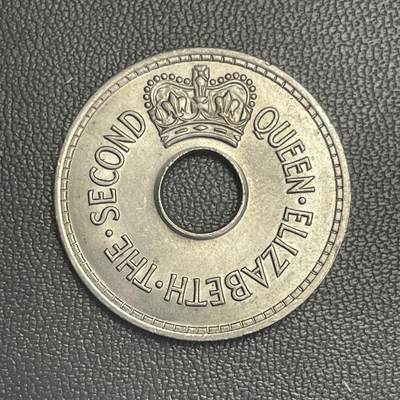 回流0315 - 斐济1967年1便士圆孔硬币 伊丽莎白二世时期发行的最后一批便士硬币，也是斐济货币十进制改革前的代表性品种，以独特的圆孔形制为标志