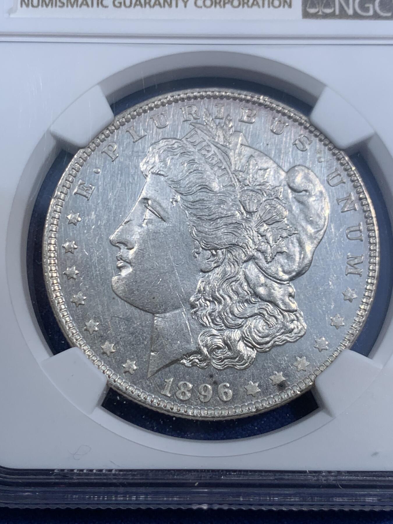 《竞宝斋》第470场 周日，周一，周二 3场连拍 （全场包邮）欢迎送拍 NGC UNCD 美国1896年摩根银币 底板质感不错