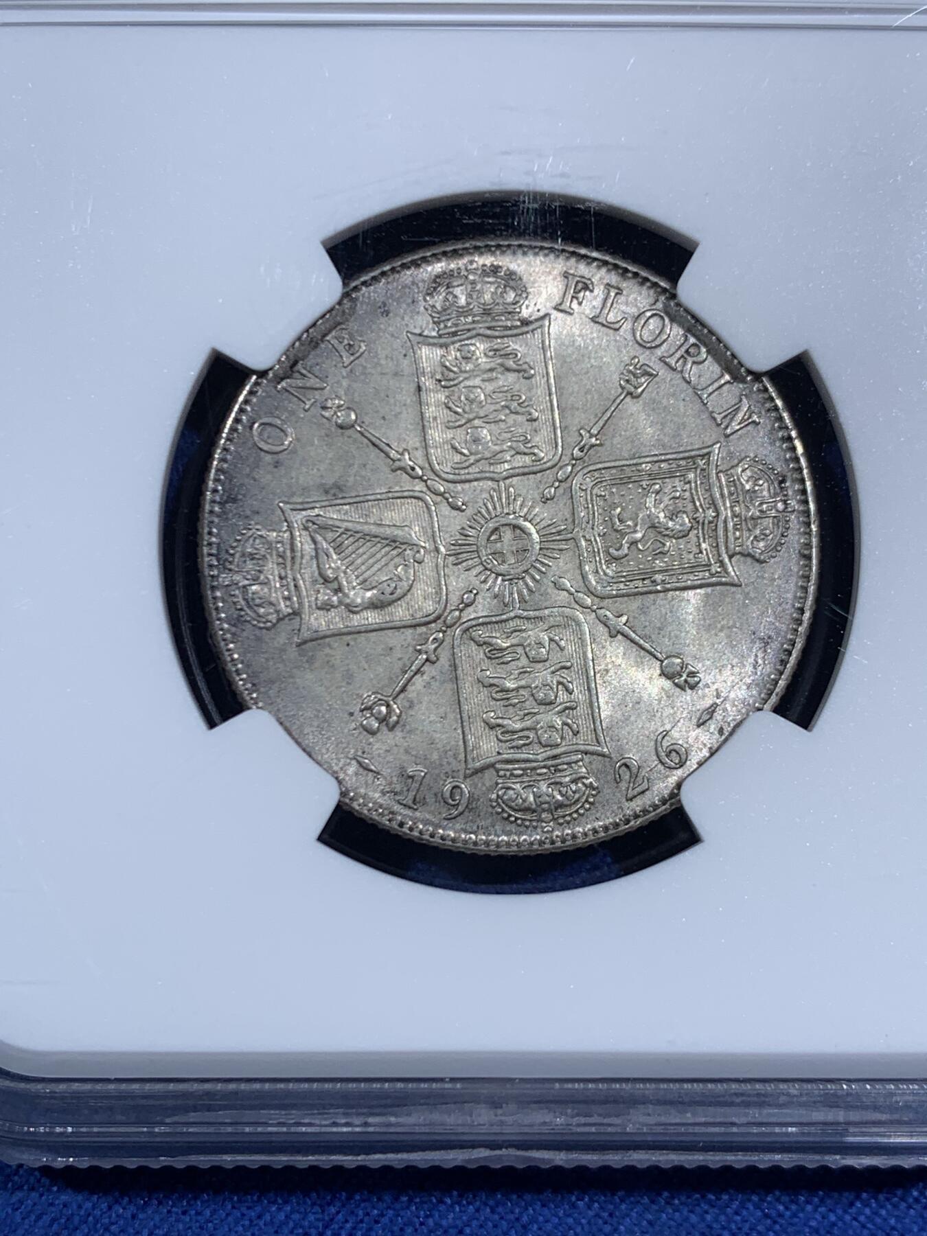 《竞宝斋》第470场 周日，周一，周二 3场连拍 （全场包邮）欢迎送拍 NGC MS64 英国1926年乔治五世流通版1福林银币，1福林=2先令。原色银光，状态舒服。流通充分的品种，高分很难得，更高仅有4枚，乔五流通凑套必备。克书价同分175美元