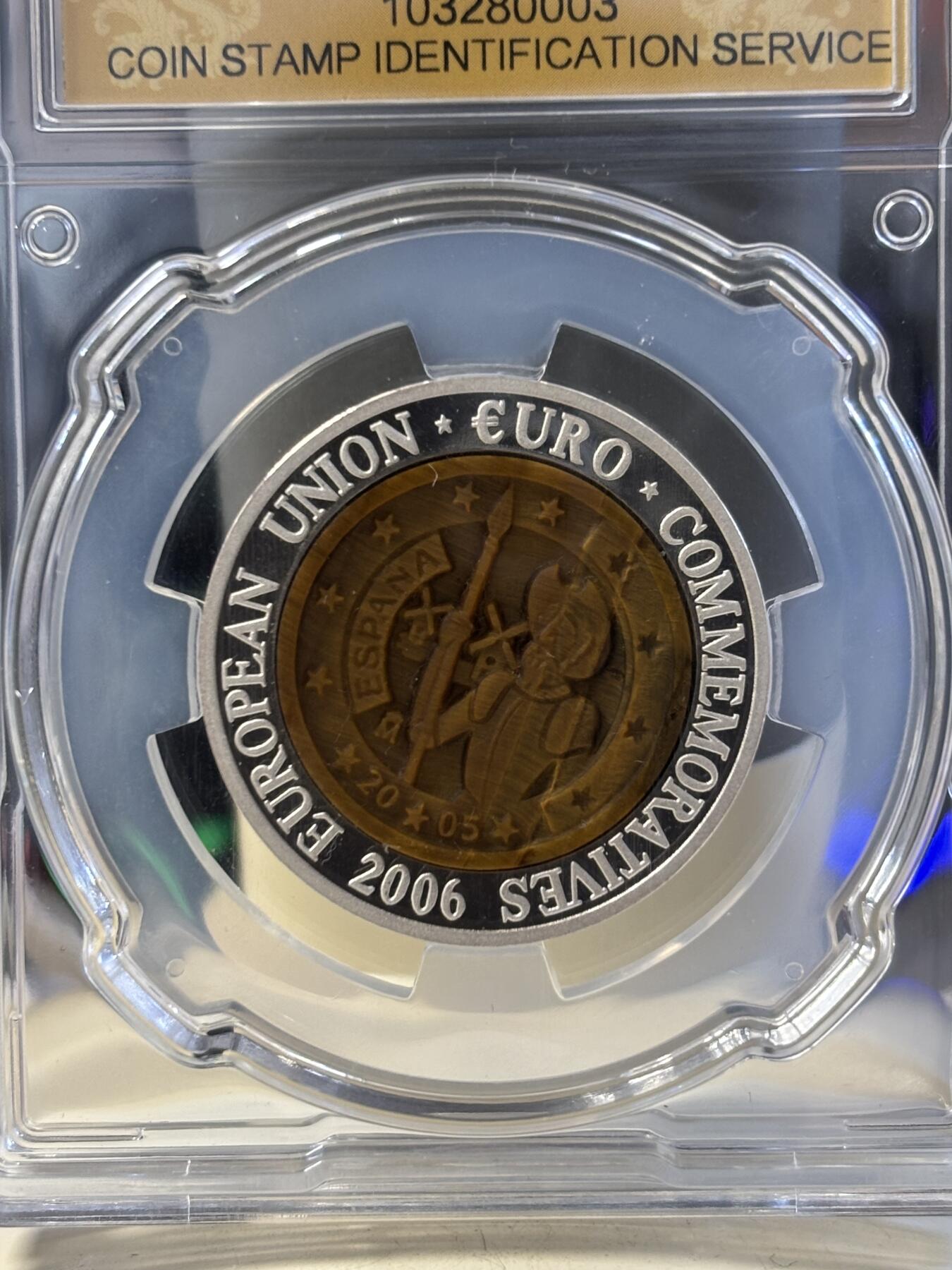 第194期拍卖 朝鲜2006年西班牙镶嵌虎眼石纪念银币信泰评级69分，999银，15.5克，发行3000枚