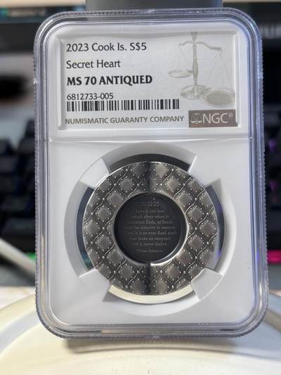 第194期拍卖 - 库克2023年秘密之心独特的爱1盎司仿古纪念银币NGC-MS70,999银，发行2023枚