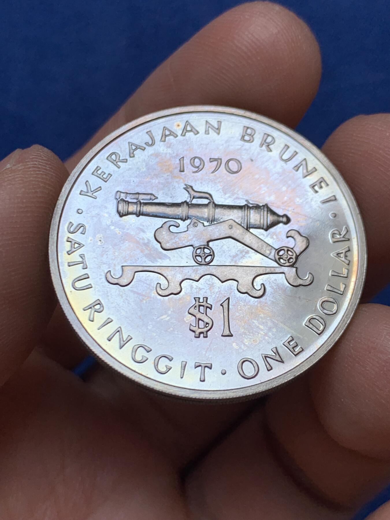 《竞宝斋》第470场 周日，周一，周二 3场连拍 （全场包邮）欢迎送拍 文莱 1970年 1元 精制镍币 文莱大炮币 不是常见的1979或1985年版 PF未流通品相 镜面原光 稀少品种