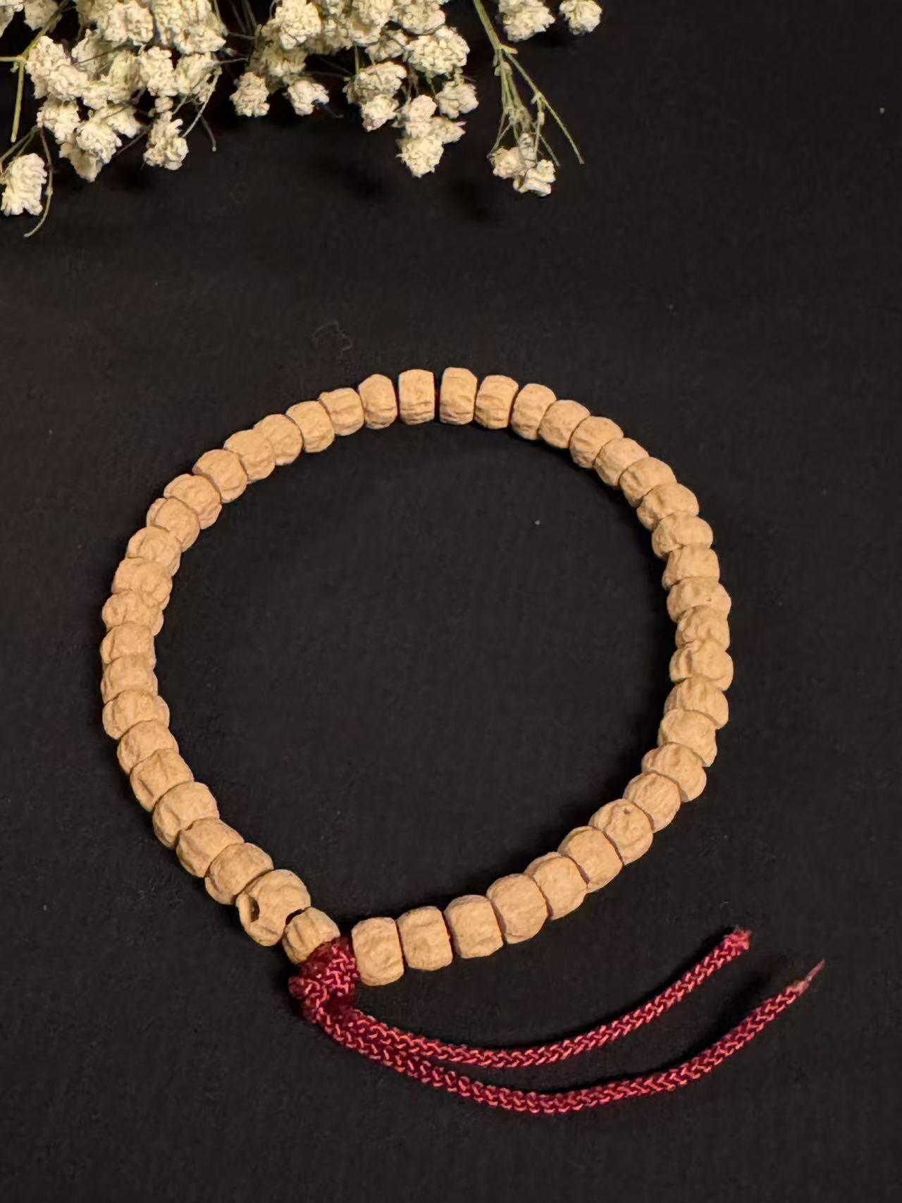 零元拍：百香籽 手持 手串 7/5MM左右