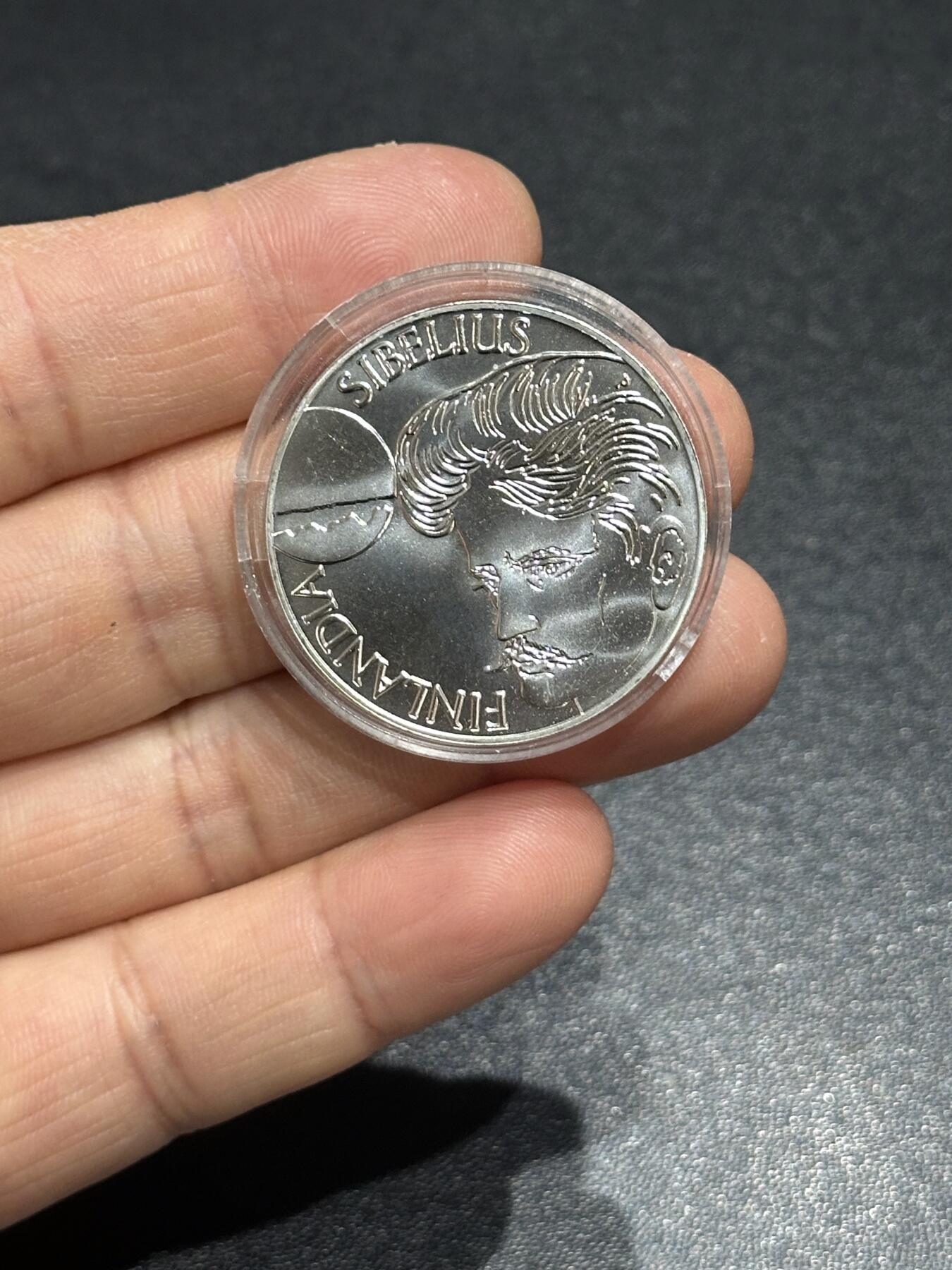 《外钞收藏家》第六百一十八期（精品场）（长期征集拍品、欢迎藏友们联系合作） 芬兰1999年100马克精制著名音乐家西贝柳斯纪念银币（22克925银）