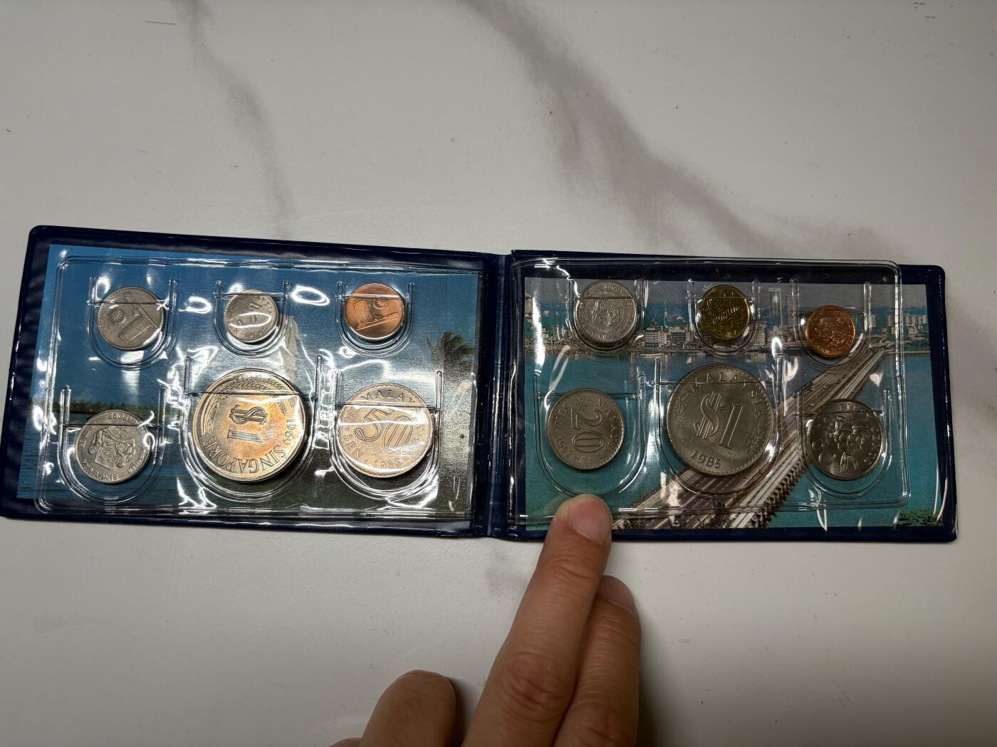 2026年集古藏今外币拍卖第三期-第5场—（总第315拍），可以寄存60天，满160元包邮。 新加坡、马来西亚套币一本