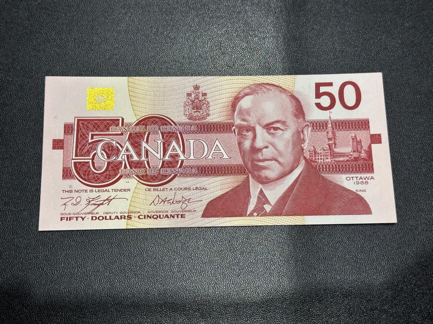 《外钞收藏家》第六百一十八期（精品场）（长期征集拍品、欢迎藏友们联系合作） 加拿大1988年鸟版50元（北极雪鸮，号码全程无4）	UNC