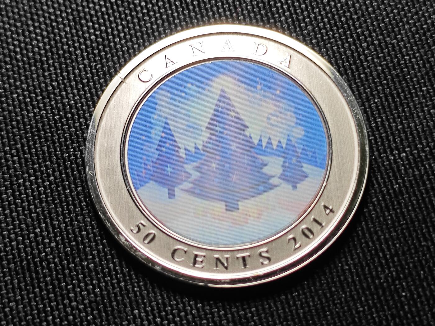 KK钱币收藏小铺   套币专场 2月预留时间 周末发货  2014加拿大50分 幻彩纪念币 带盒