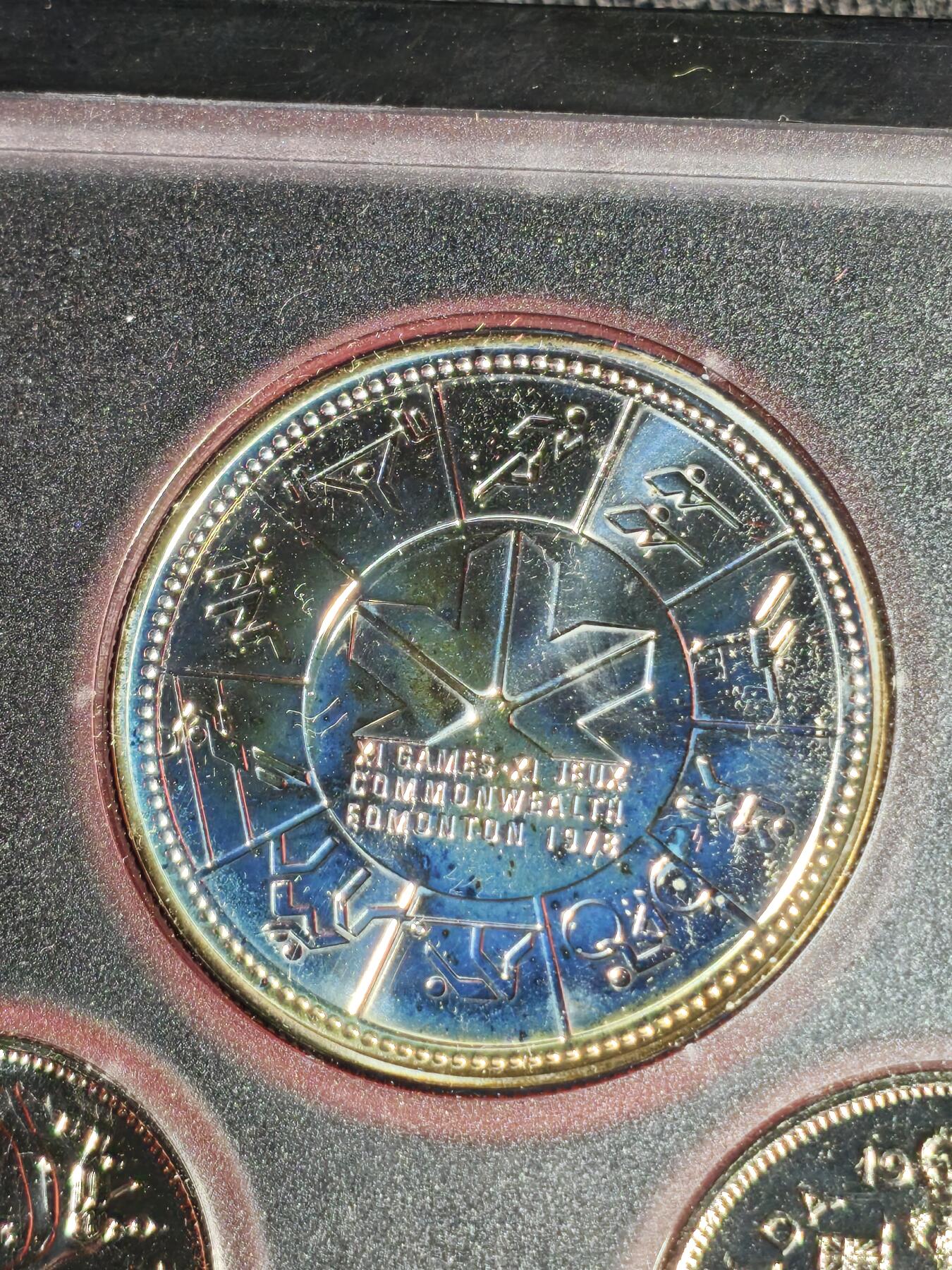 刘世昌艺术品销售中心～虎踞龙蟠*金杨在线联拍群第519期 加拿大1978年《英联邦运动会》原装精铸币一套7枚，其中壹枚1元是银币，重23.33克。原盒证，品相如图。