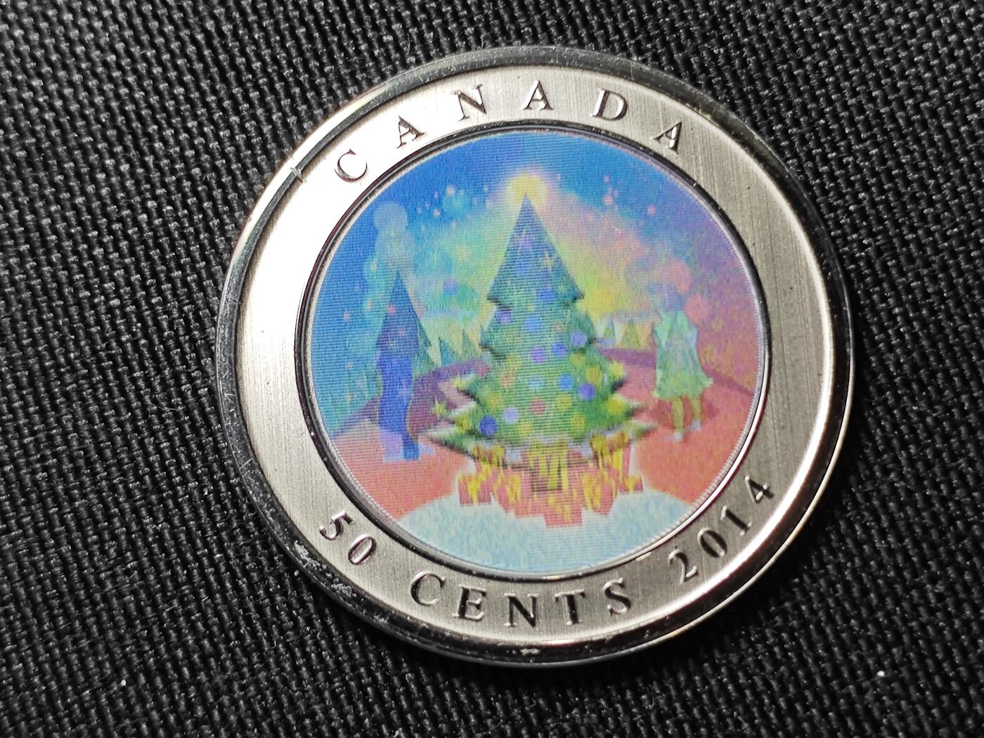 KK钱币收藏小铺   套币专场 2月预留时间 周末发货  2014加拿大50分 幻彩纪念币 带盒