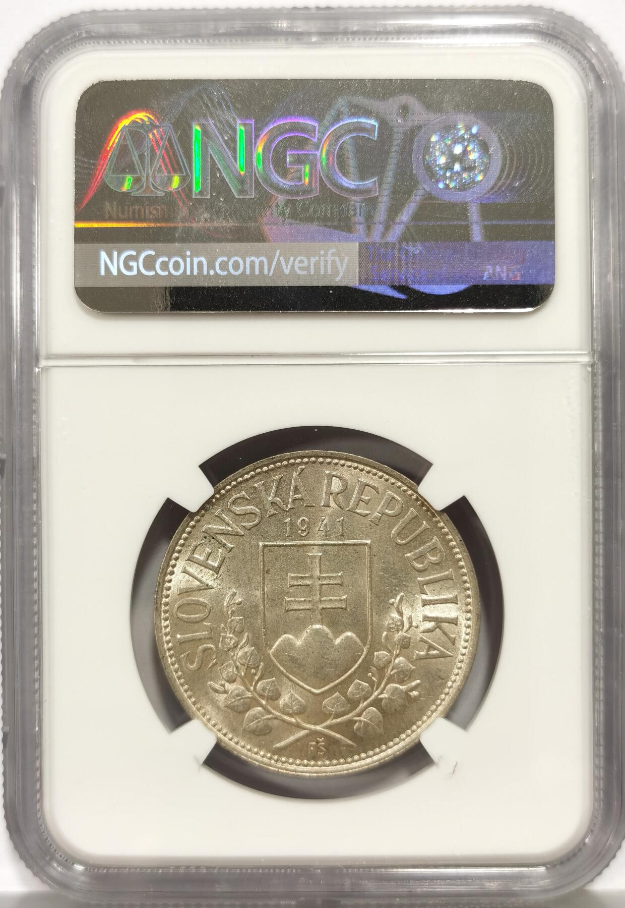 博洋堂世界钱币拍卖第165期（全场包邮） NGC MS62 斯洛伐克1941年20克朗银币，淡黄油包浆，转光好品，不多见的品种。