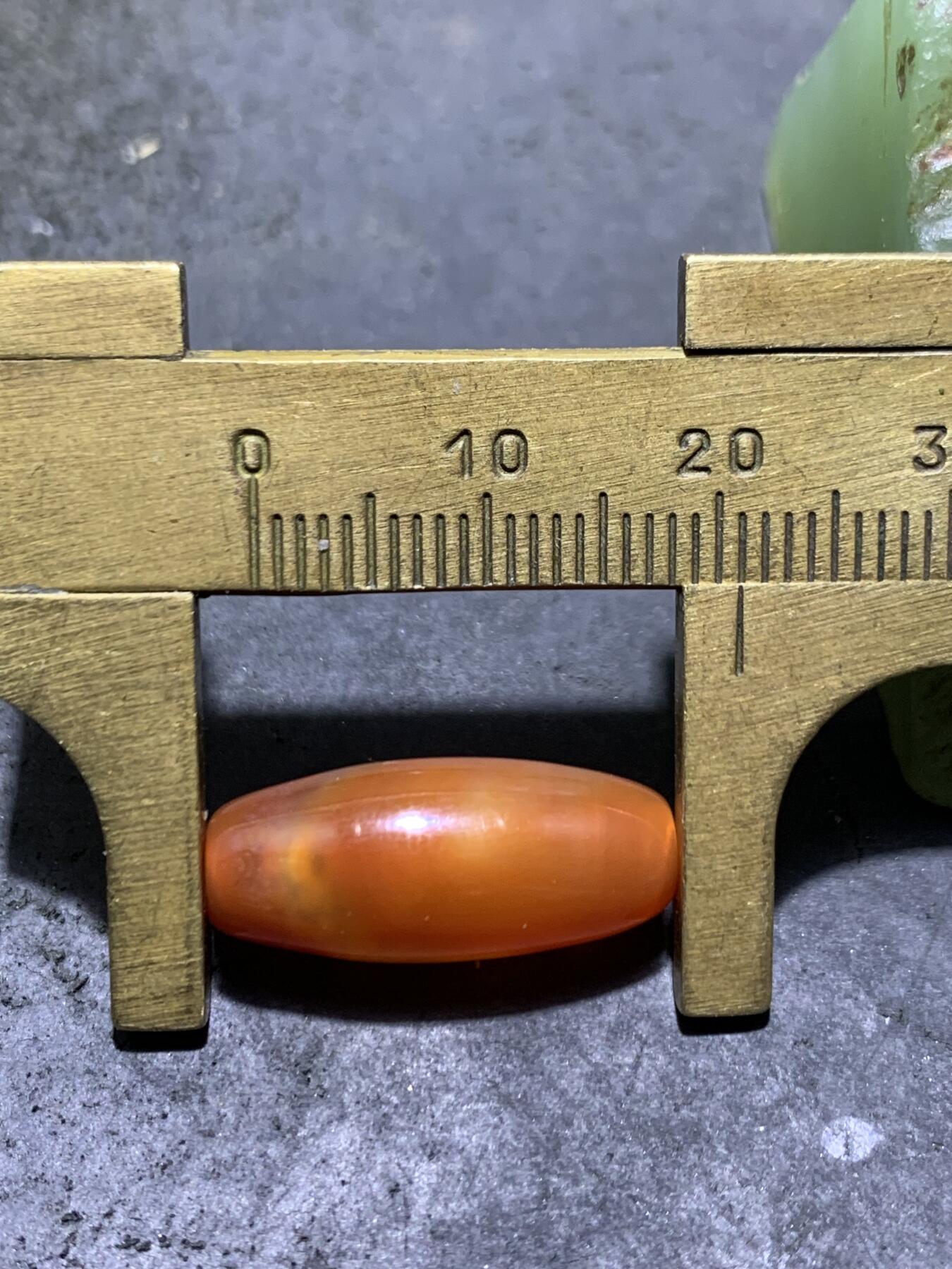 精美高玉化柿子红玛瑙天眼纹桶珠一颗，