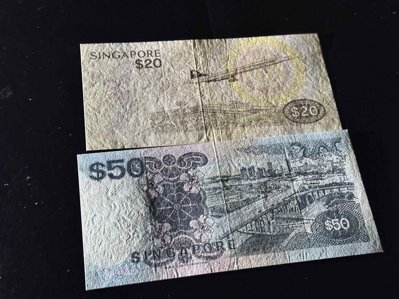 《外钞收藏家》第六百一十九期（精品场）（长期征集拍品、欢迎藏友们联系合作） 新加坡鸟版20+船版50元 2张一起 非全新 品相如图