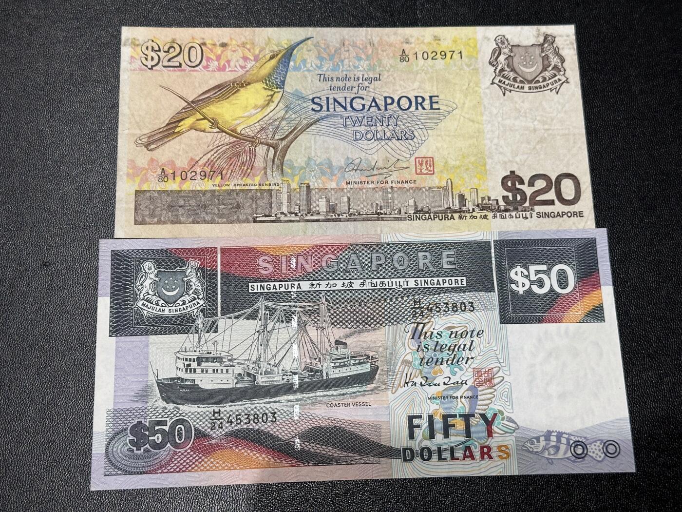 《外钞收藏家》第六百一十九期（精品场）（长期征集拍品、欢迎藏友们联系合作） 新加坡鸟版20+船版50元 2张一起 非全新 品相如图