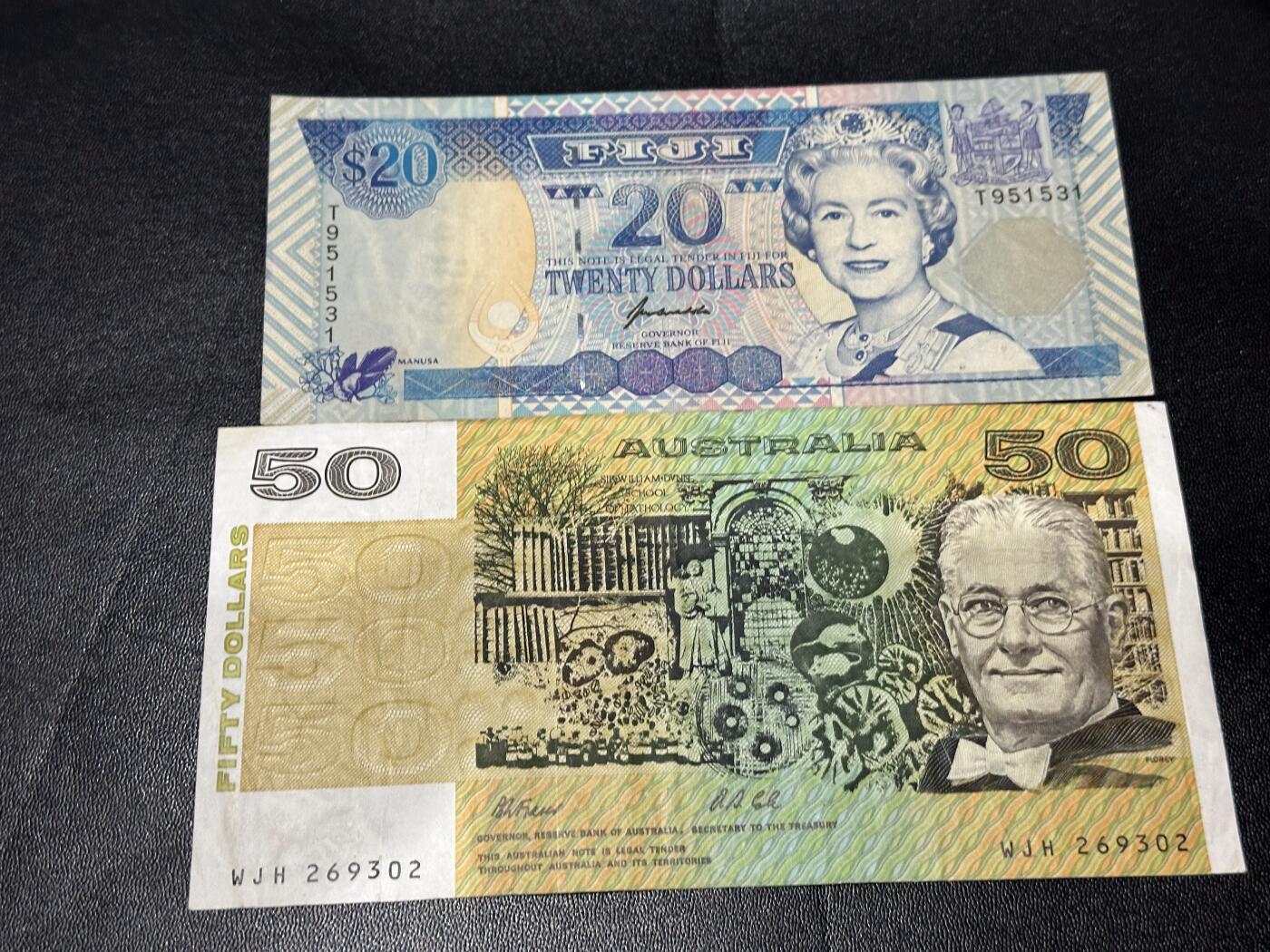 《外钞收藏家》第六百一十九期（精品场）（长期征集拍品、欢迎藏友们联系合作） 斐济20+澳大利亚50元2张一起 非全新 品相如图 号码无47