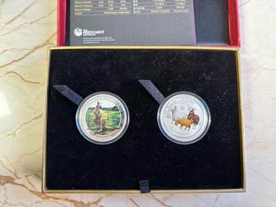 第193期拍卖 - 澳大利亚2014年50分普制彩色银币2枚套 北京国际币展-袋鼠和羊年 2*1/2盎司999银 发行量：1千套 盒证全