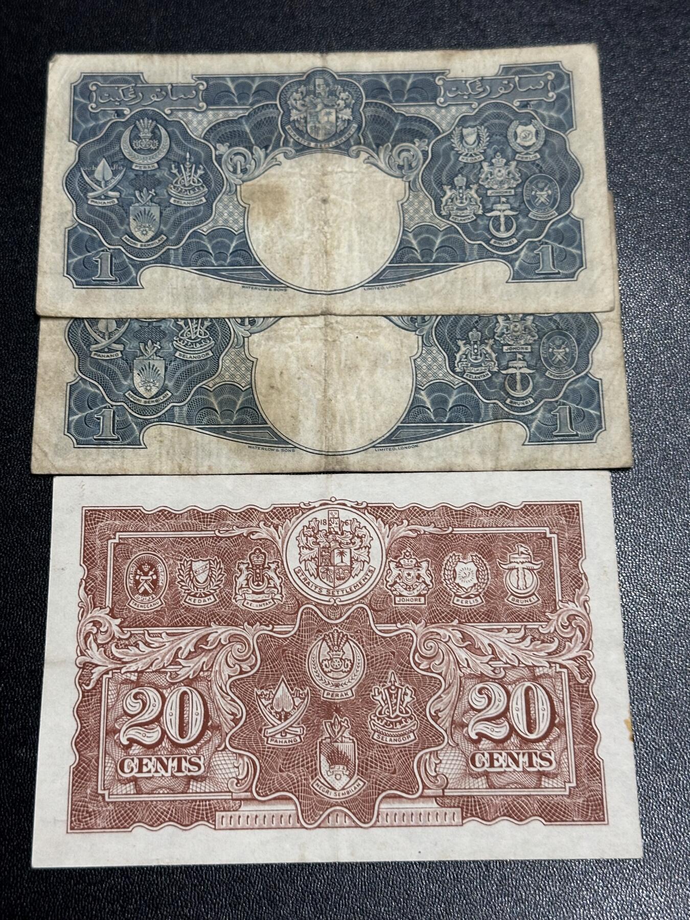 《外钞收藏家》第六百一十九期（精品场）（长期征集拍品、欢迎藏友们联系合作） 英属马来亚 乔治六世 1元2张和20分1张一起 非全新 品相如图