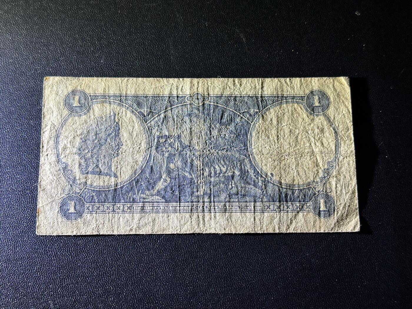 《外钞收藏家》第六百一十九期（精品场）（长期征集拍品、欢迎藏友们联系合作） 马来亚 海峡殖民地 叻屿呷国库银票1935年1元 胡须佬 非全新 品相如图