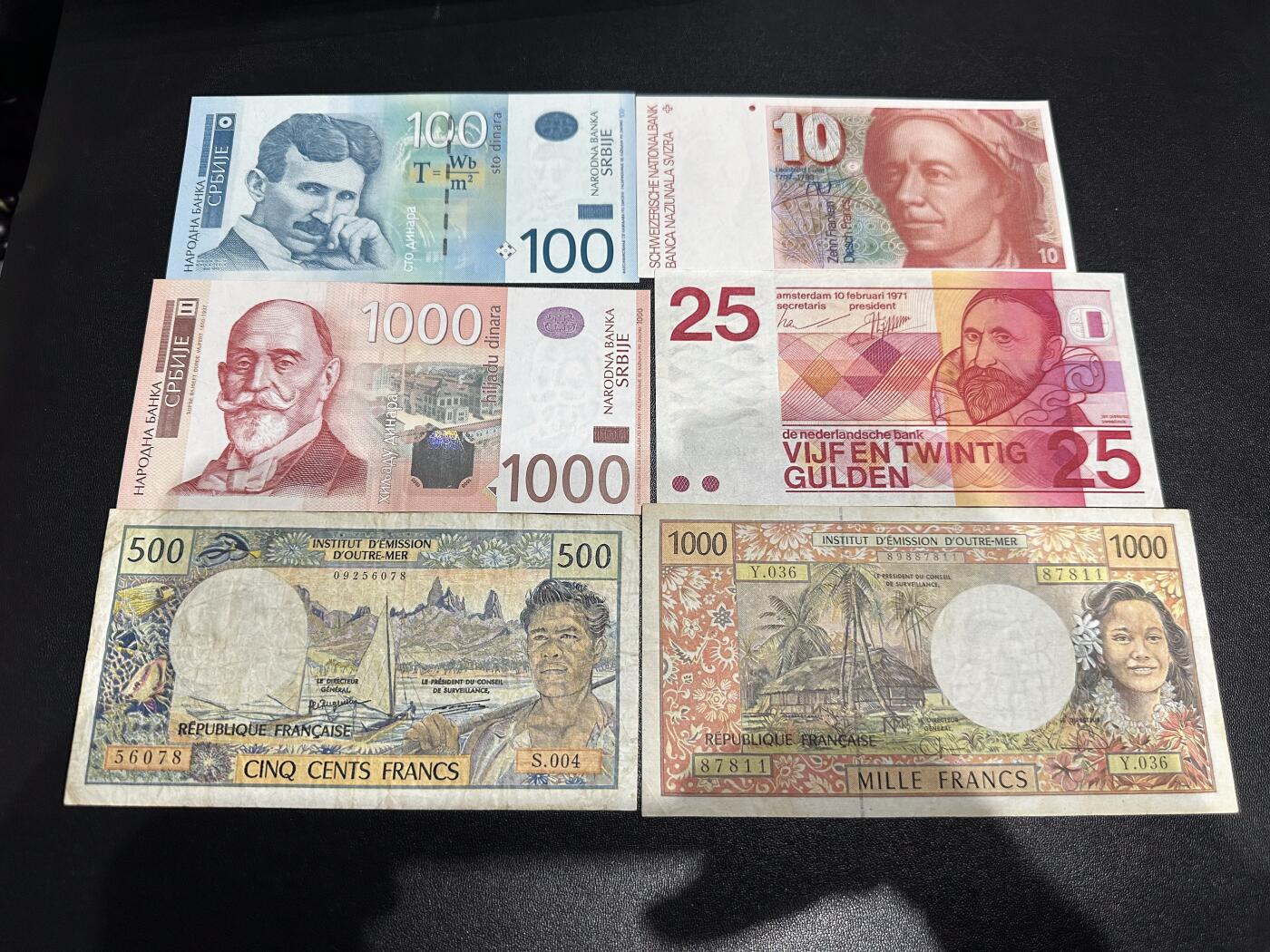 《外钞收藏家》第六百一十九期（精品场）（长期征集拍品、欢迎藏友们联系合作） 塞尔维亚100、1000、瑞士10法郎、荷兰人像25盾、法属太平洋500和1000法郎 六张一起  除了塞尔维亚100全新 其他非全新